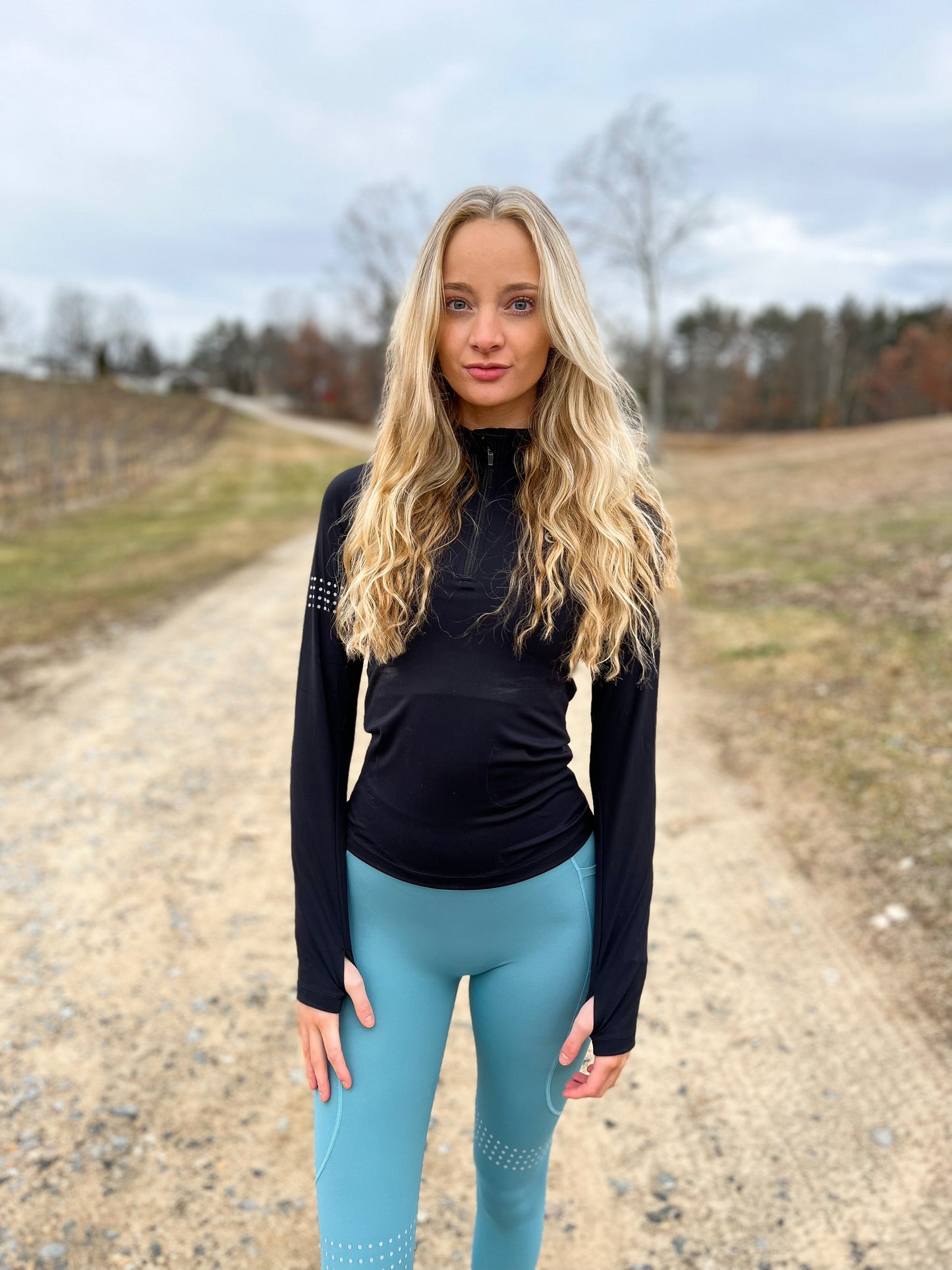 Winter running quarter zip with reflective designs so you are seen at night while running. Soft, durable, and functional all in one top.