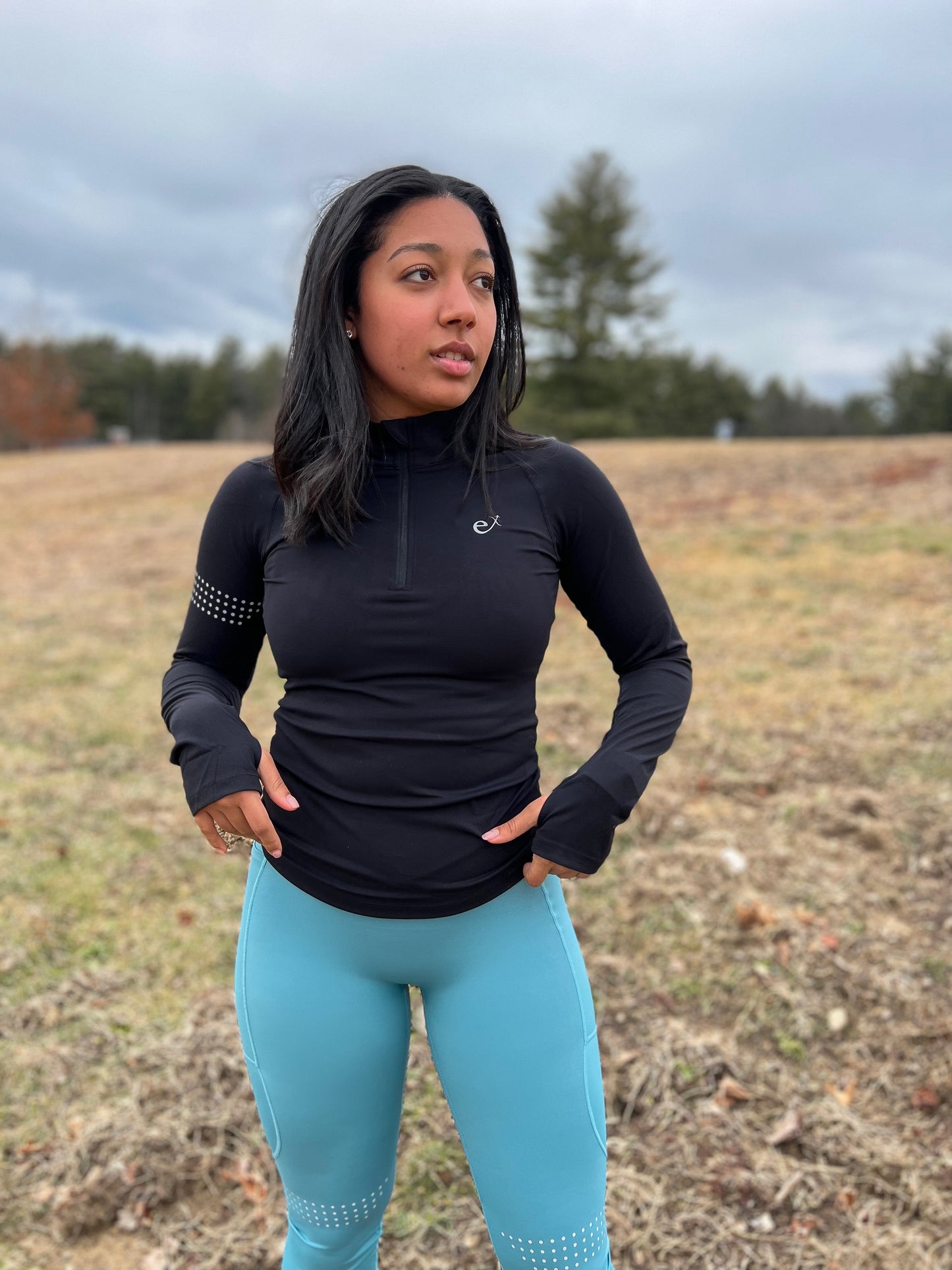 Winter running quarter zip with reflective designs so you are seen at night while running. Soft, durable, and functional all in one top.
